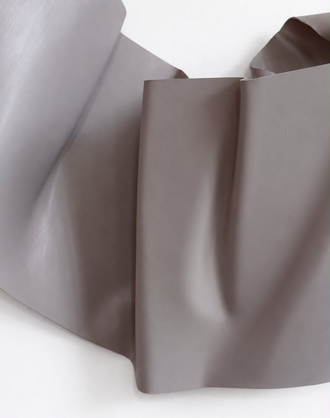 Folded taupe form on white by Krista Haldenby